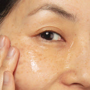 Applying Rose & Hyaluronic Acid Serum Under Eye