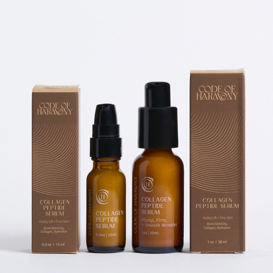 Code of Harmony Collagen Peptide Serum 0.5 oz and 1 oz bottles with product boxes