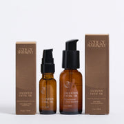 Code of Harmony Salvation Facial Oil 0.5 oz and 1 oz bottles with product boxes