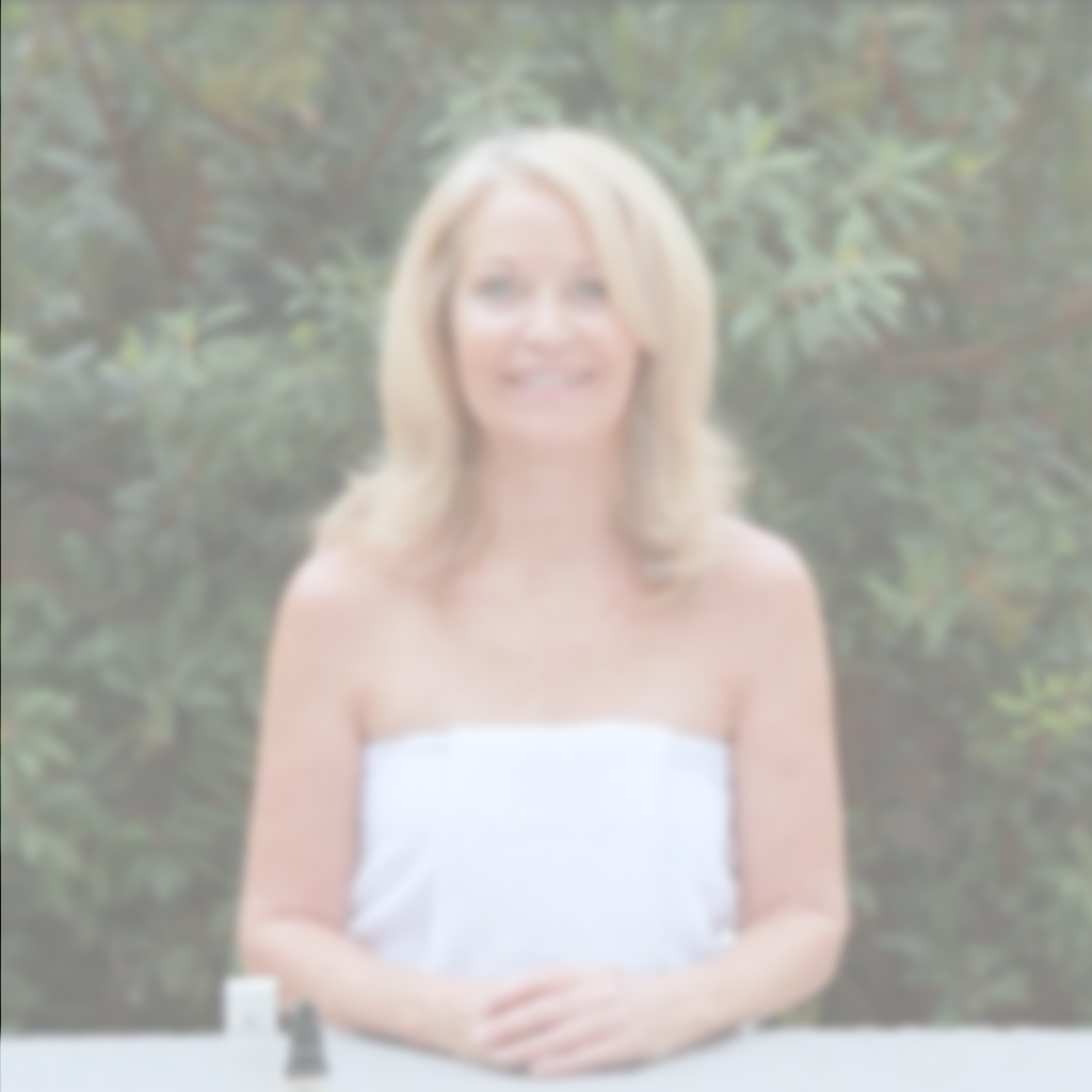 Woman using skincare products as part of a daily eye care routine