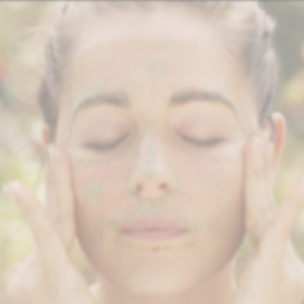 Woman enjoying a natural skincare ritual with Annmarie Ayurvedic Facial Scrub