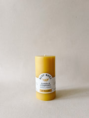 Single Busy Bees 3 Inch Pillar Trio beeswax candle standing upright against a minimal neutral backdrop.