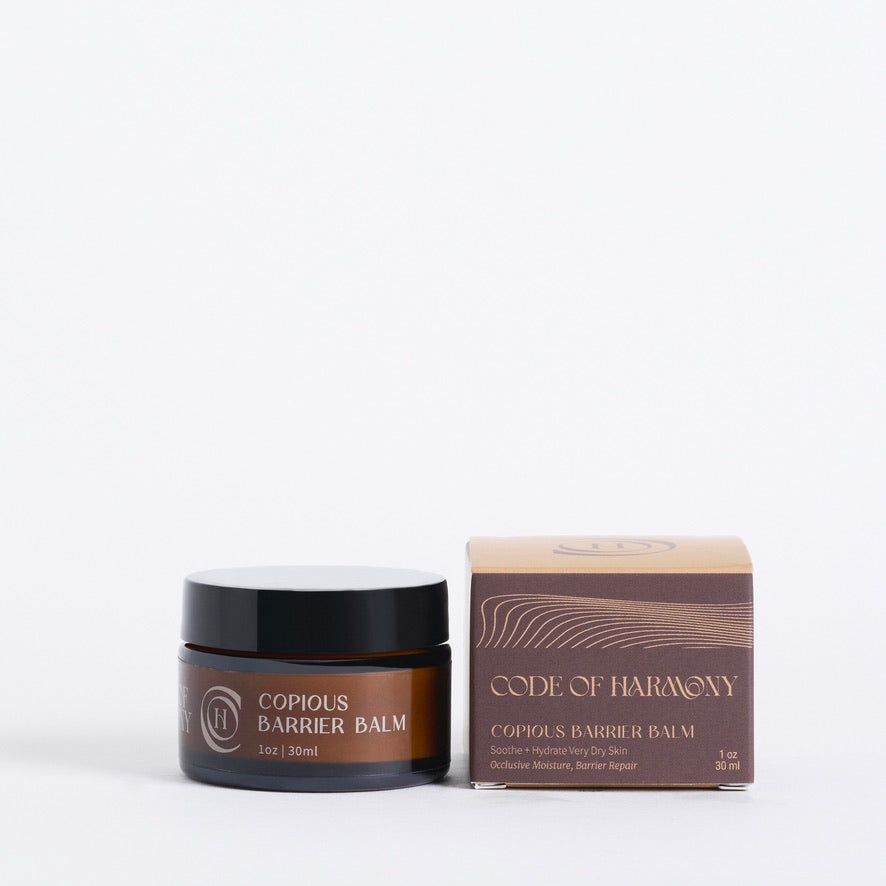 Code of Harmony Copious Barrier Balm jar with product box