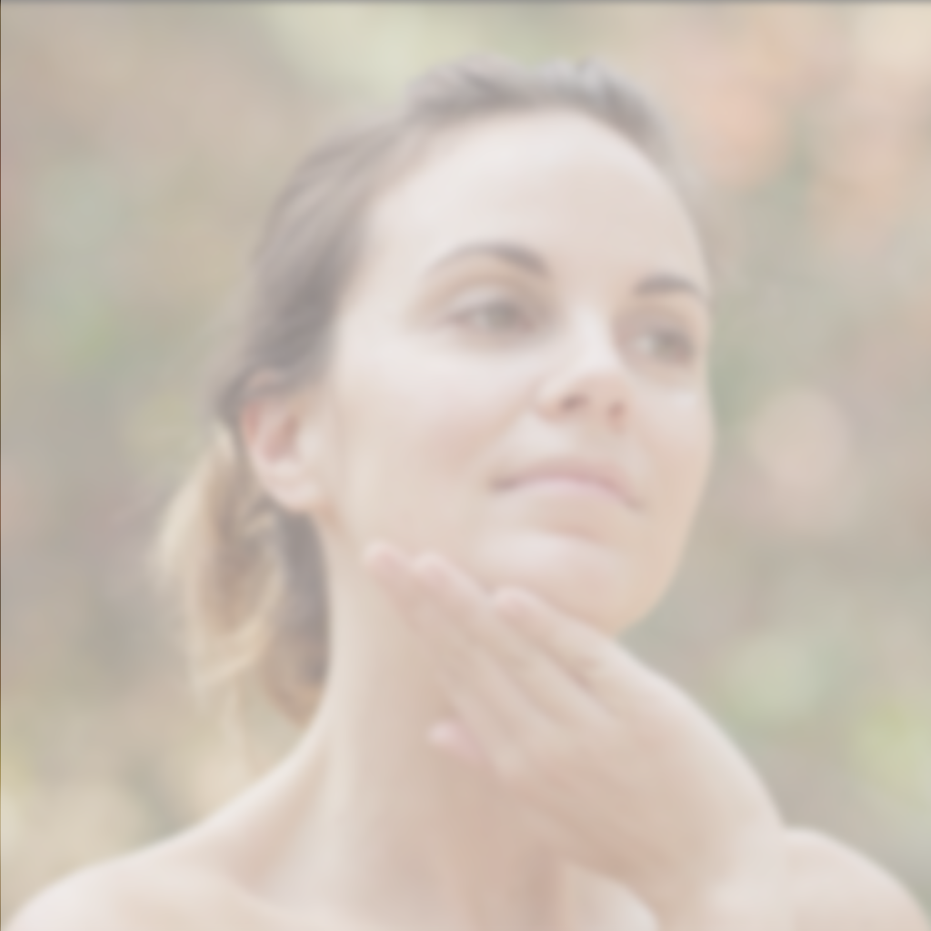 Woman enjoying a skincare routine with Annmarie Coconut Honey Mask for hydrated, glowing skin