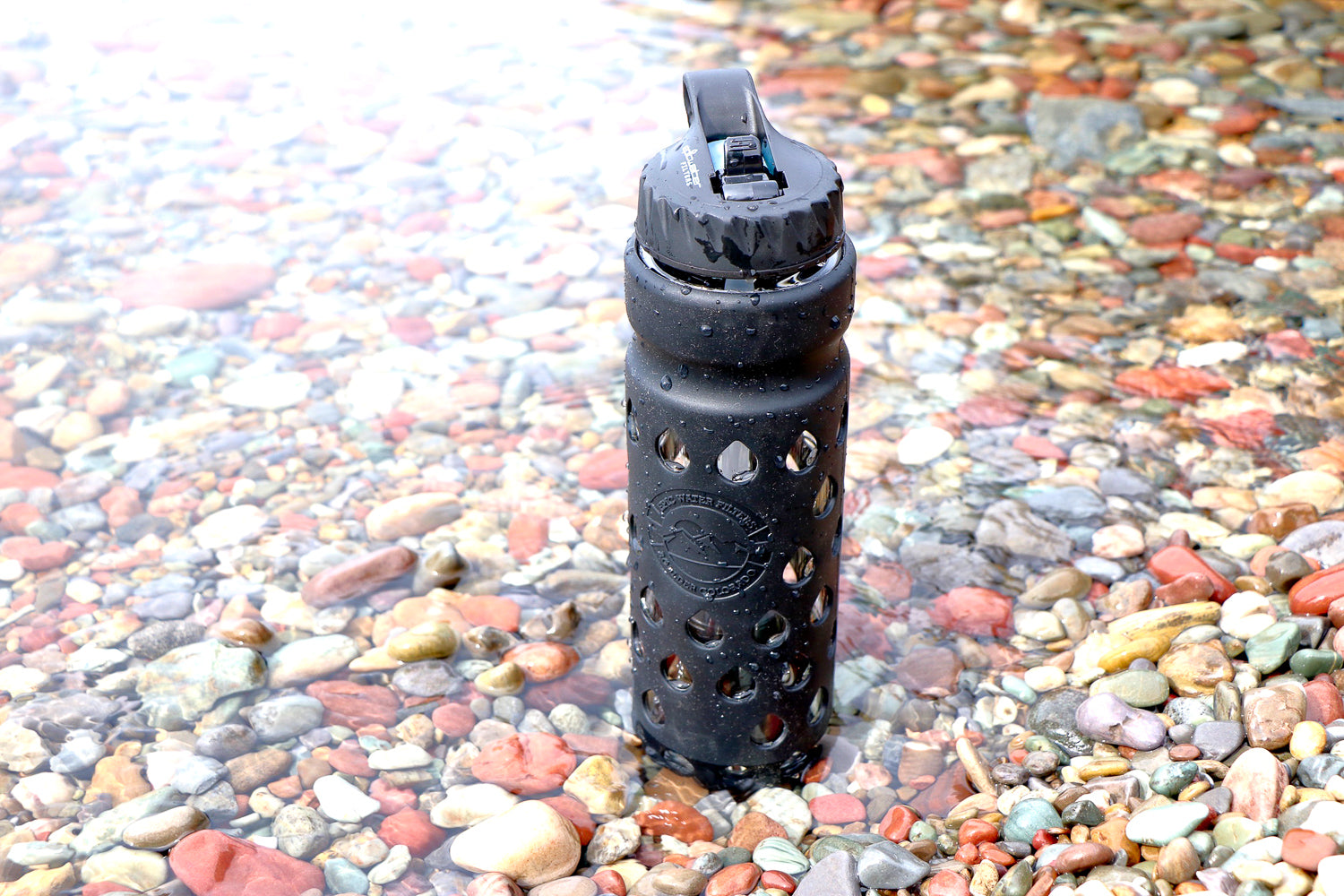 Black Epic Escape Glass Bottle with Filter 32 oz in stream