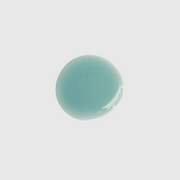Blue-green texture swatch of Code of Harmony Blue Tansy Oil Cleanser