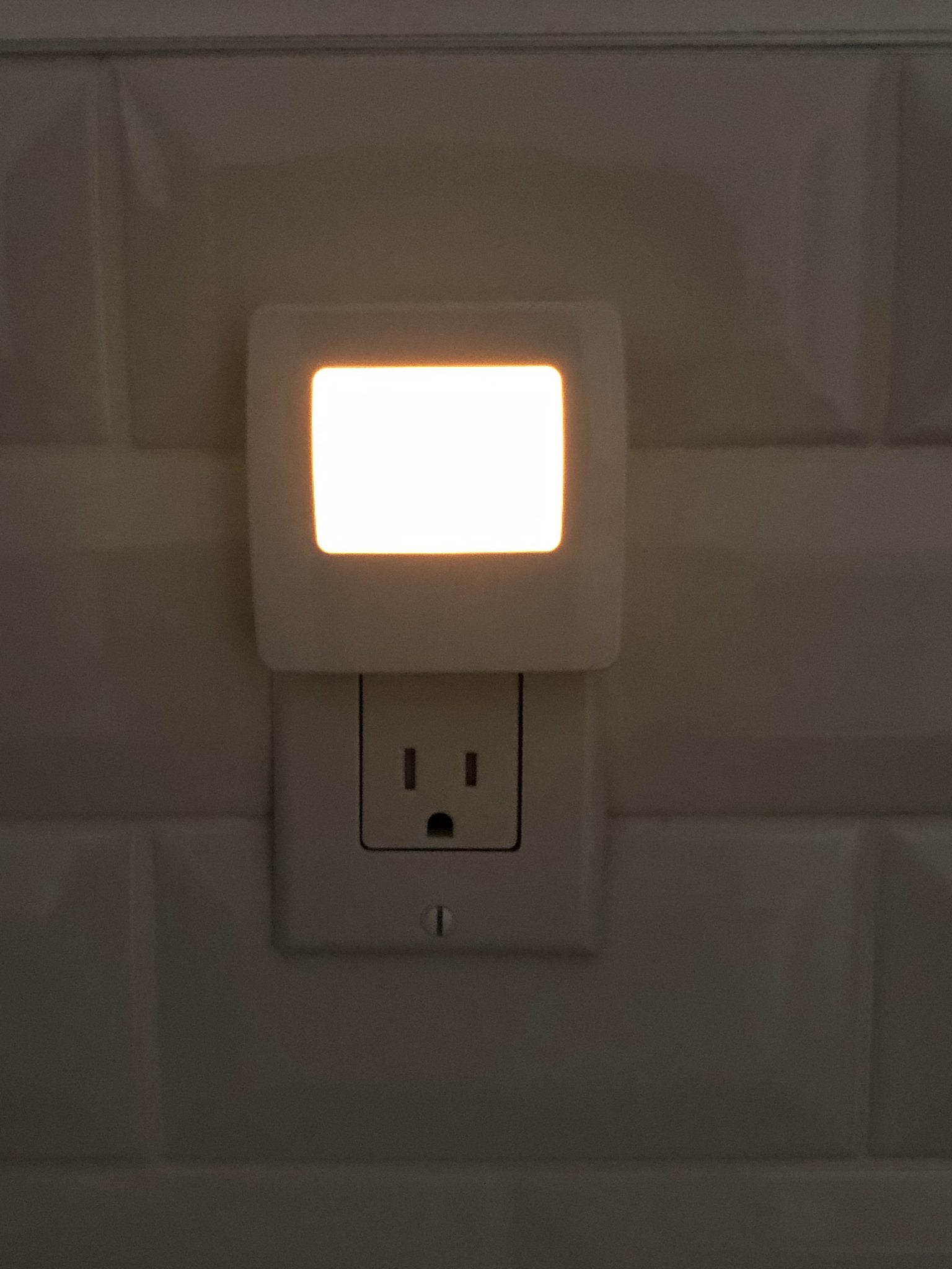 Automatic Activation: The Slim Night Light senses light/dark conditions and turns on automatically when the room's lights are turned off.