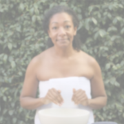 Woman applying Annmarie Kaolin Micro Exfoliant as part of a natural skincare routine