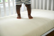 Lullaby Earth Healthy Support Baby Crib Mattress has a feature patented waterproofing and a WaveSupport 