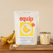 Equip Prime Protein banana bag with bananas and a creamy protein drink