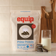 Equip Prime Protein low-sugar cookies and cream bag with cookies and a protein drink