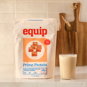 Equip Prime Protein salted caramel bag with caramel pieces and a protein drink