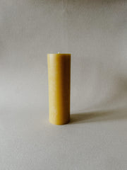 Single Busy Bees 3 Inch by 9 Inch pillar candle in natural yellow beeswax displayed against a soft neutral background.