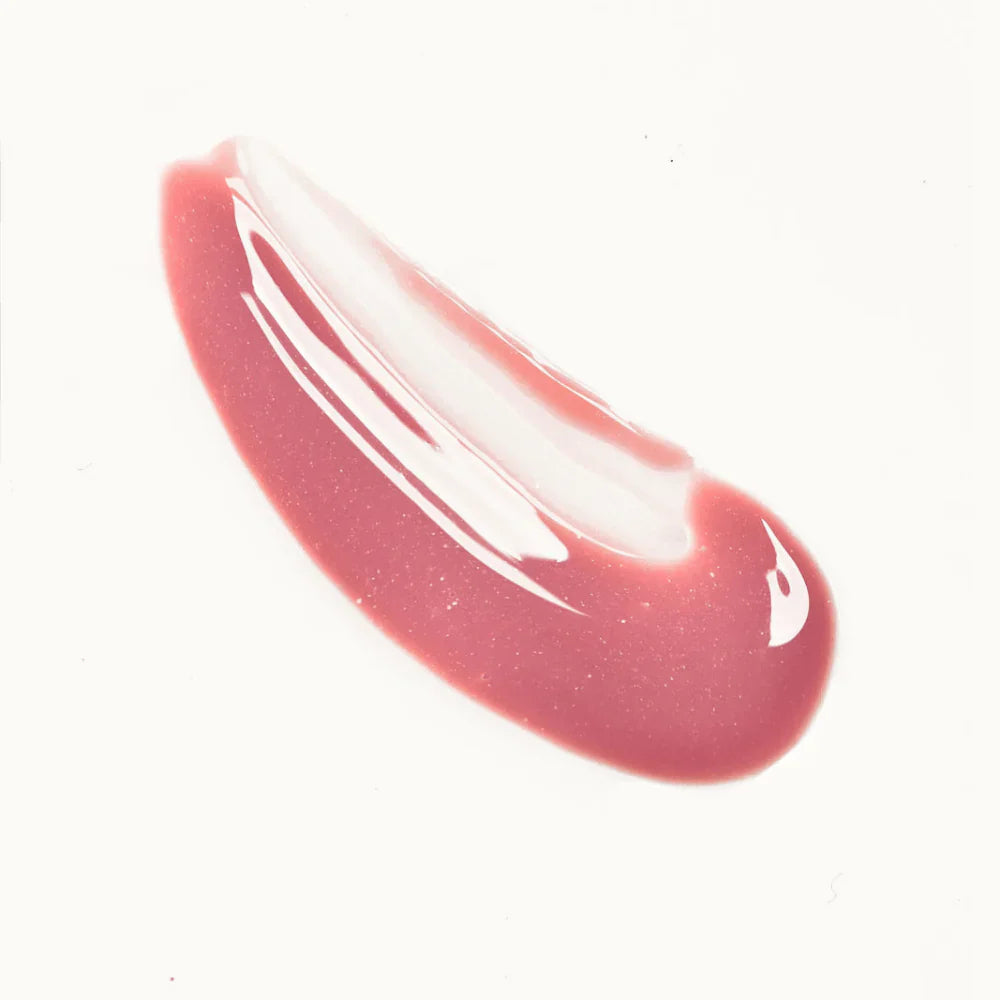 Swatch of pink Mama Sol LIPBRELLA™ mineral lip oil gloss