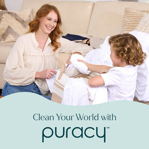 Mother and child folding laundry with Puracy Laundry Stain Remover for cleaner clothes and everyday fabric care