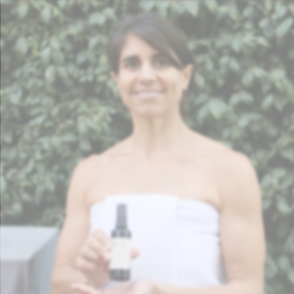 Woman using Annmarie Rosemary Toning Mist as part of a natural skincare routine