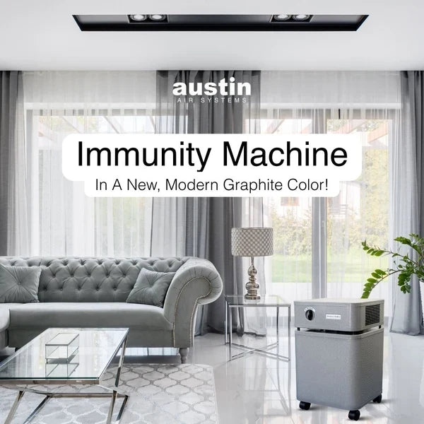 Austin Air Immunity Machine graphite air purifier in a modern living room
