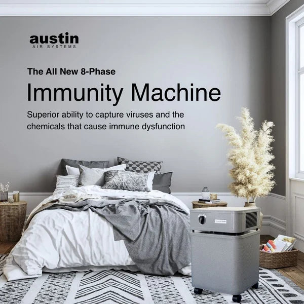 Austin Air Immunity Machine air purifier in a bedroom featuring advanced 8-phase air filtration
