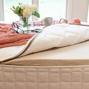 Organic Cotton Fabric & Fill: Naturepedic uses certified organic cotton sourced directly from USDA-certified suppliers