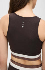 Back view of the Elastique Athletics Le Monde Bra in dark brown highlighting the racerback design and centered logo detail.