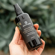 Woman using botanical hydration mist as part of a skincare routine