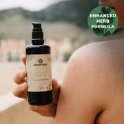 Annmarie Coconut Body Oil with enhanced herb formula for soft, hydrated skin