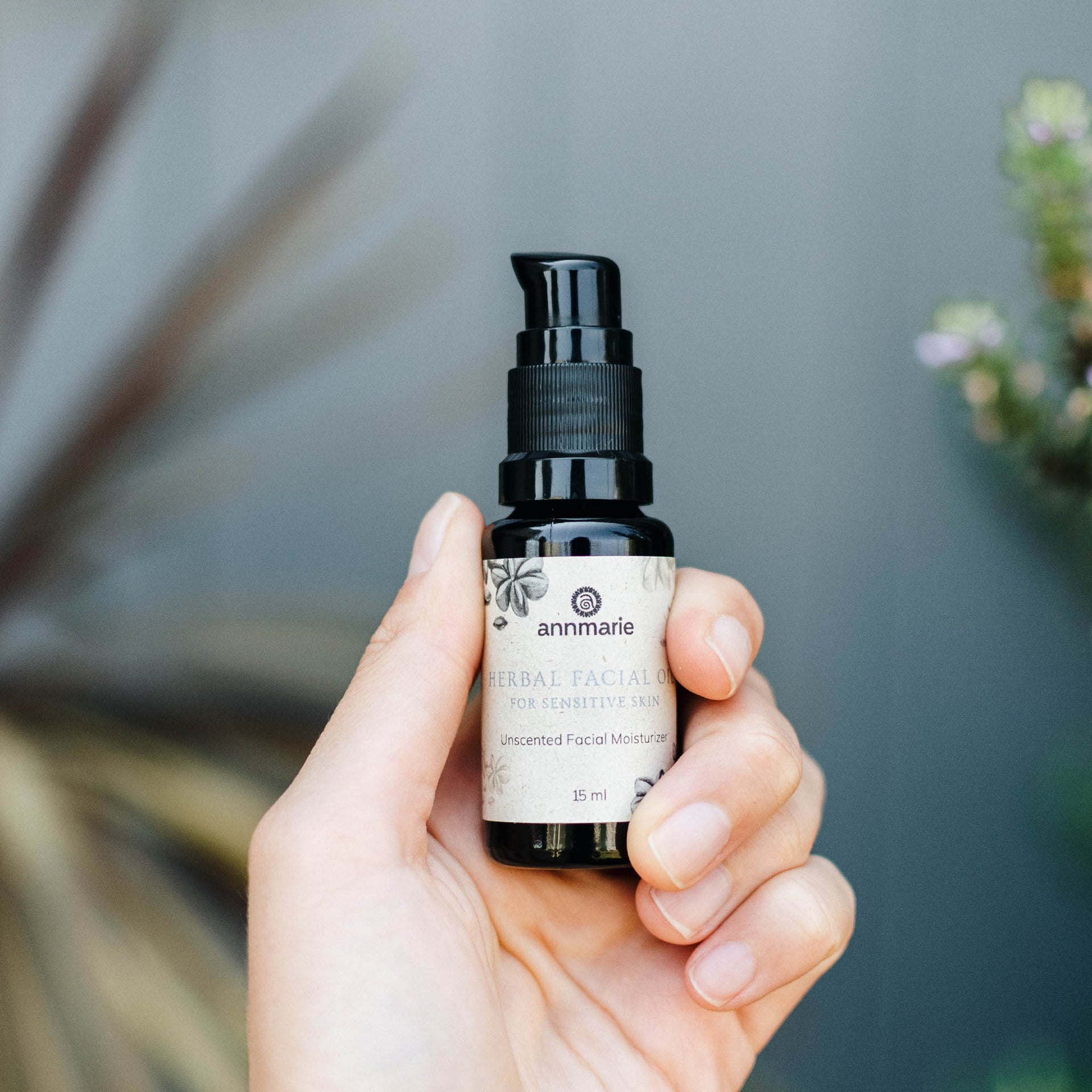 Annmarie Herbal Facial Oil for Sensitive Skin fragrance-free facial oil held in hand