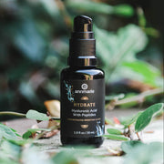 Annmarie Hydrate boosting elixir displayed with botanical ingredients