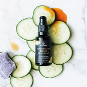 Annmarie Resurfacing Facial Exfoliant displayed with fresh cucumber slices