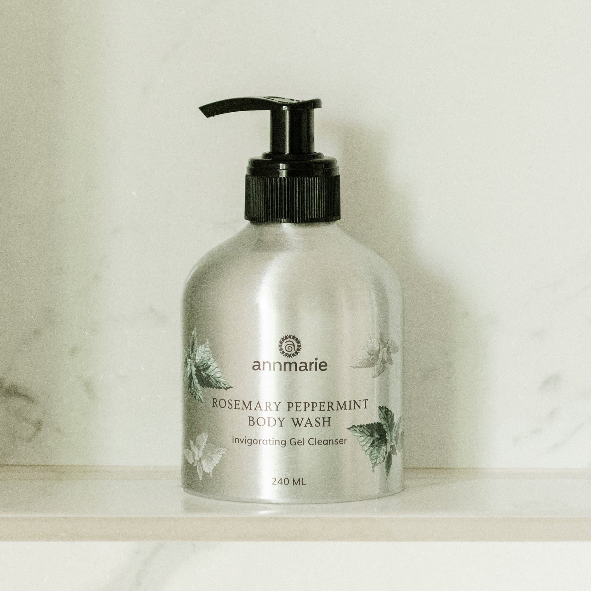 Annmarie Rosemary Peppermint Hand & Body Wash displayed in a natural bathroom setting