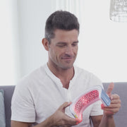 Hairmax LaserBand 82 ComfortFlex being used by a man