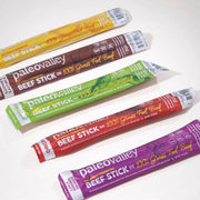 Close-up of PaleoValley 100% grass-fed beef sticks in original, jalapeño, and garlic flavors